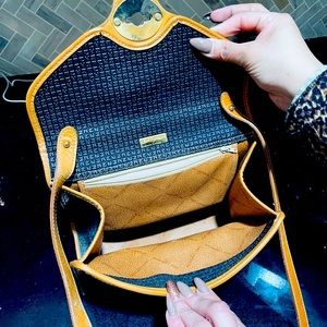 Vintage Ted Lapidus adjustable strap purse with trademark TL,  pre owned.